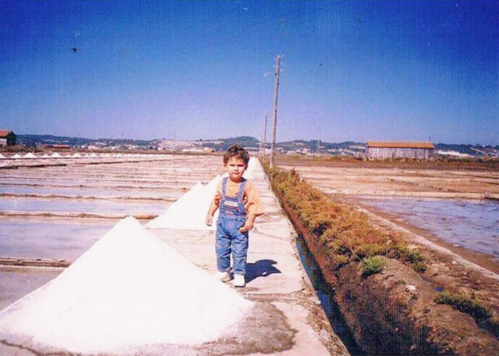 Daniel Silva as a boy in his grandfather's salt farm, Figueira da Foz